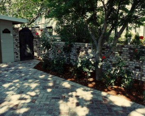 Landscape Architect designed brick driveway and garden wall